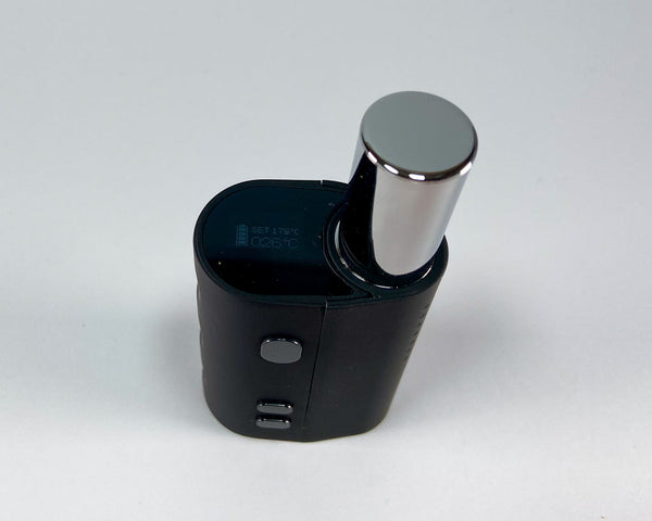 Mini dry herb vaporiser. Top view with cap.